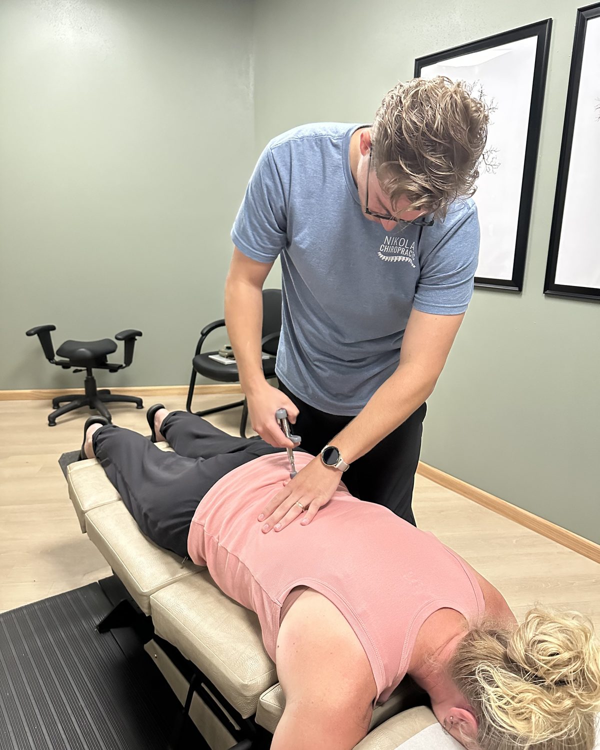 Dr. Matt using the Activator instrument on a patient